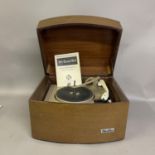 A Pye Black Box record player with four-speed Garrard turntable in veneered teak enclosure.