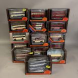 A collection of 17 Exclusive First Editions die cast models of buses, coaches and trams all carrying