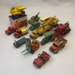 A collection of die cast service vehicles, including a boxed Dinky 562 Dumper Truck, a Dinky Blaw