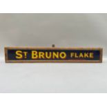 A vintage advertising enamelled tin sign 'St Bruno Flake, in yellow and red on dark blue, now in