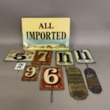 A collection of nine painted tin grocery price tags and advertising signs, including two match