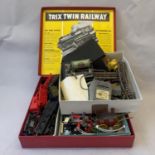 Three boxes of Tri-ang 00 gauge spares and accessories, including two locomotives, die cast figures,