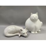 French porcelain figure of a cat in repose in raku white glaze together with another very large