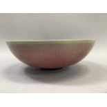 Peter Sparrey British (b1967) A Studio porcelain bowl, rose tinted glaze with radiating vertical