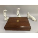 Three USSR figures stoats, one with an egg in its mouth, an oak canteen box lined with red material