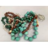 A collection of mid-20th. Century bead necklaces including Cornelian, rock crystal, Malachite and