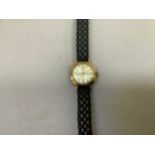 A Tudor ladies Royal wristwatch c1965 in 9ct gold cushion case made for Rolex No404580, signed 17
