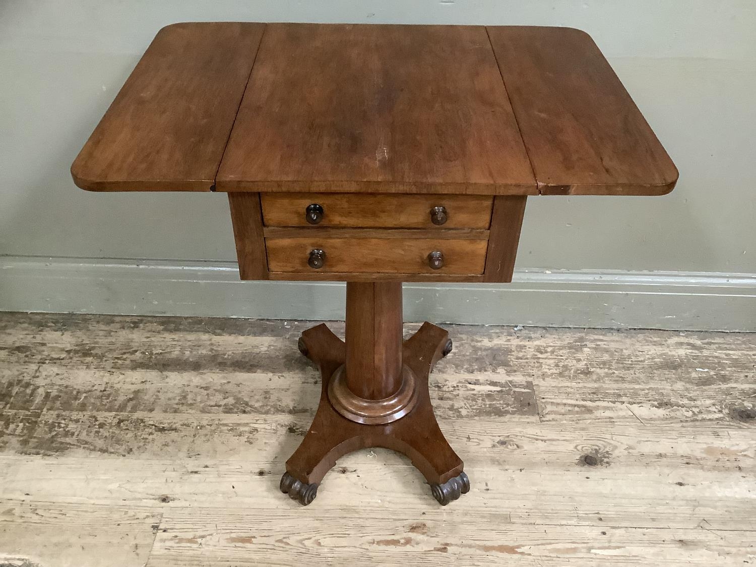 A Victorian rosewood work table with two drop leaves, two long drawers, on column supports with - Image 3 of 3