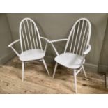 A pair of Ercol painted spindle back chairs