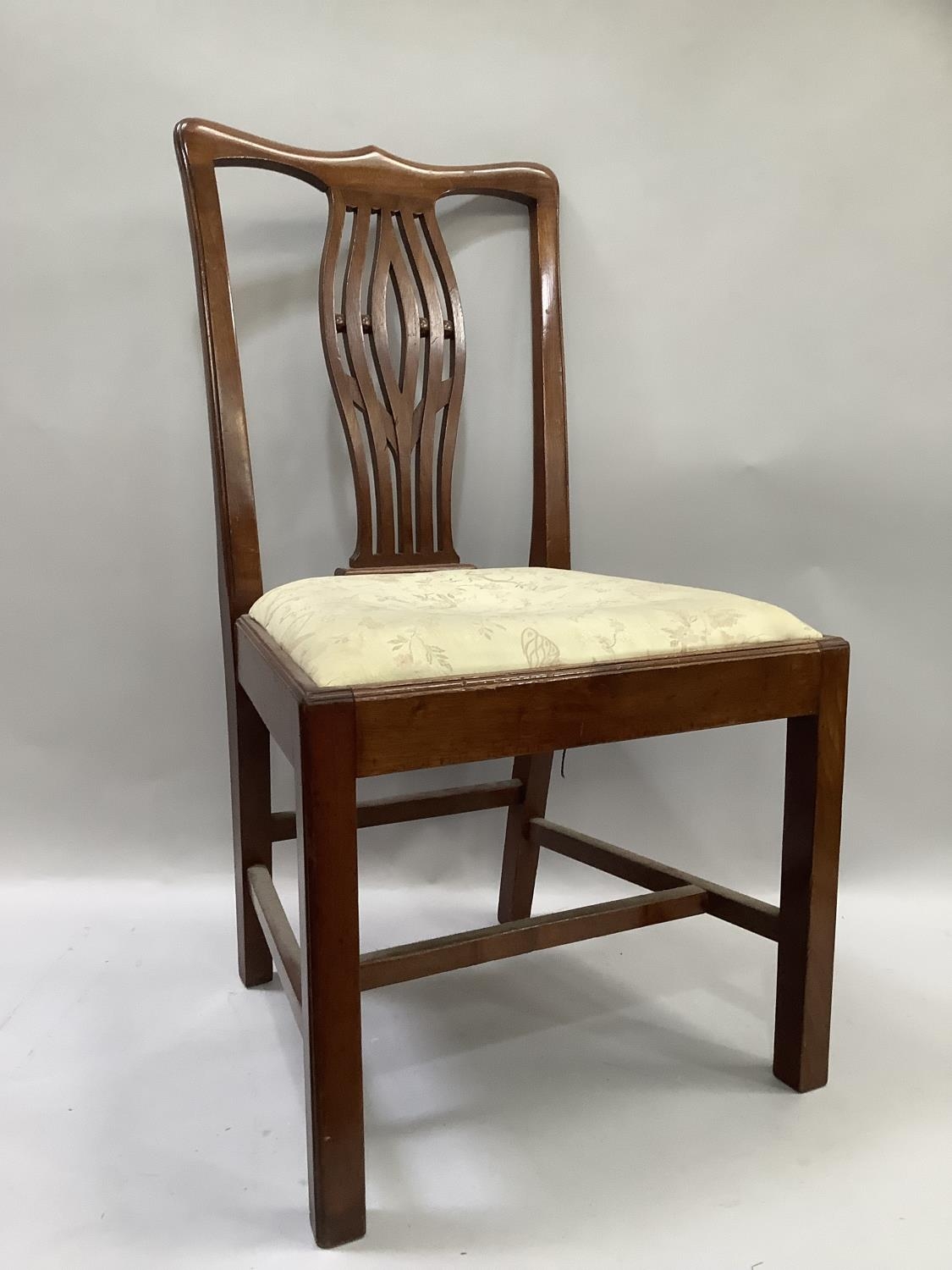 A mahogany splat back Georgian chair, on square legs, cream upholstered fabric