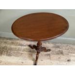 Walnut and mahogany oval tripod window table, on turned support and carved legs, 59cm wide