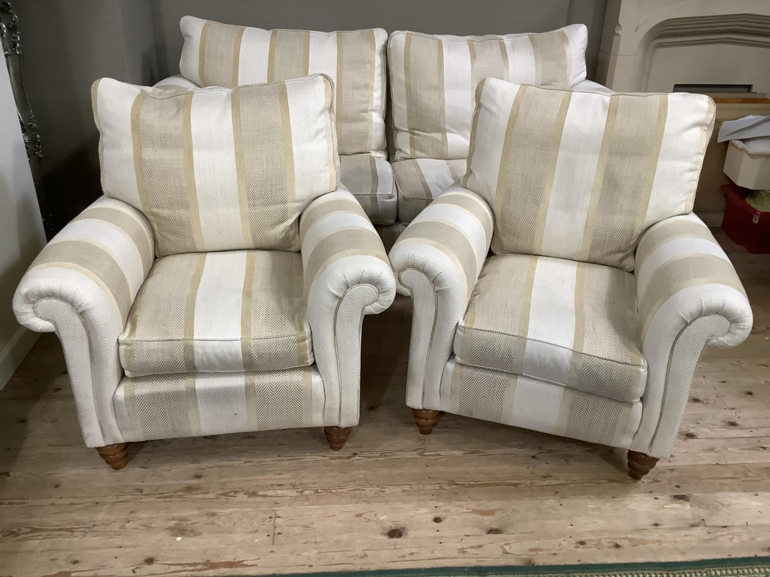 A Duresta three seater sofa upholstered in ecru and cream herringbone fabric together with two