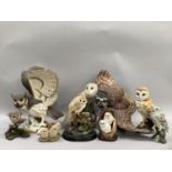 Three Franklin Mint porcelain owl figures, modelled with wings outstretched together with further
