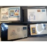 Two ring folders with approximately 100 world FDC's including India, Australia and Isle of Man,