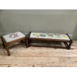 An oak tapestry stool on baluster legs with stretcher together with another low tapestry stool on