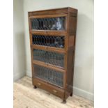 An early 20th Century mahogany Globe Wernicke style stacking bookcase with glazed and leaded front