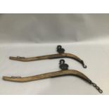 Pair of wooden & cast metal horse yokes. 81cm