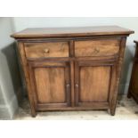 A modern hardwood sideboard with two short drawers above two doors opening to reveal internal shelf,