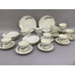 A Royal Doulton Lido pattern tea service for twelve, comprising teacups, saucers, tea plates, two