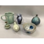 Quantity of studio pottery comprising jug with pale blue glaze and moulded handle, bulbous vase with