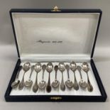 A case of twelve 800 silver coffee spoons in fitted case