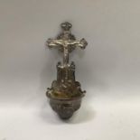 An early 20th century silver holy water font with hanging loop, 11.5cm high