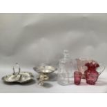 A silver plated bonbon dish on foot with pierced rim, silver plated serving platter formed as