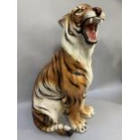 A large Italian pottery figure of a tiger realistically modelled, 85cm high