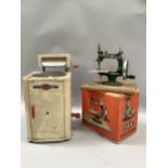 Tri-ang Servis model washer and mangle together with a GrAin mini sewing machine in green on