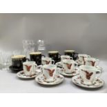 Four coffee cups and saucers with white spots on brown ground, eight eggshell porcelain cups and