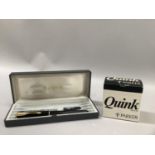 Parker fountain pen, black body with gold trim, 18k gold nib, in box with cartridges