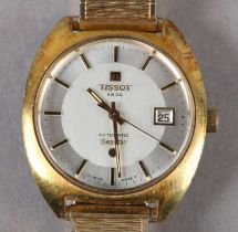 A TISSOT GENTLEMAN'S SEASTAR AUTOMATIC DATE WRISTWATCH c1970 in rolled gold cushion case with