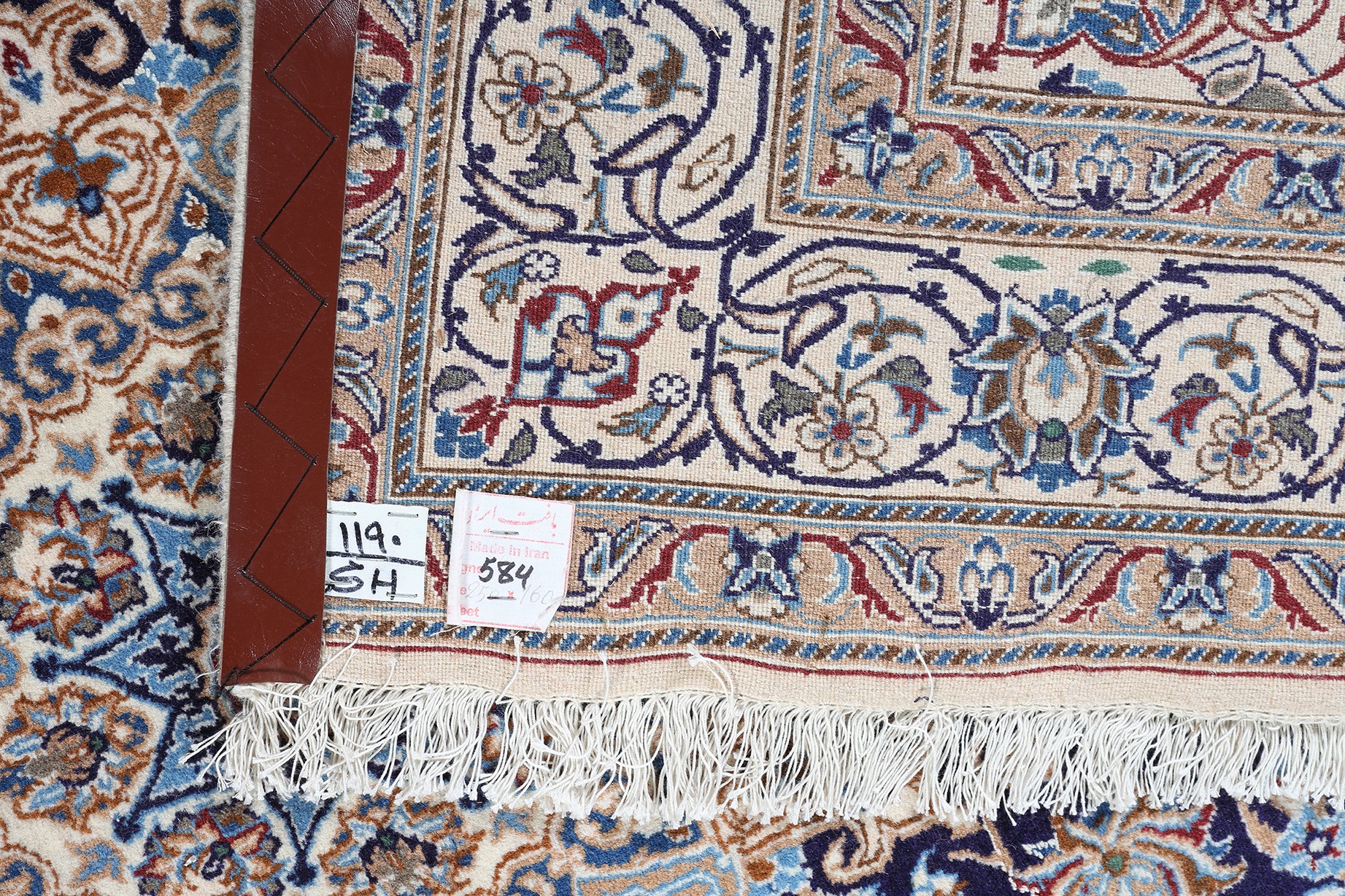 A MIDDLE EASTERN CARPET, Persian, having a blue field filled with flowering tendrils and central - Image 4 of 4