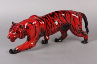 A ROYAL DOULTON VEINED FLAMBE FIGURE OF A TIGER, modelled stalking, marked to the front left paw