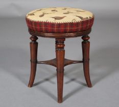 AN EARLY 19TH CENTURY MAHOGANY REVOLVING PIANO STOOL, having a circular upholstered seat with height