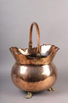 A LATE 19TH CENTURY PLANISHED COPPER COAL VASE, oval with swing handle, scalloped and folded rim