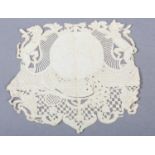 AN 18TH CENTURY FRENCH ARMORIAL CREST CUT PAPER SAMPLE flanked by two lions above ornate pierced and
