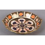 A ROYAL CROWN DERBY IMARI PATTERN TWIN HANDLED BONBON DISH, date cypher for 1825, 25cm diameter