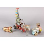 A GERMAN US ZONE TINPLATE CLOCKWORK ELEPHANT AND ZEBRA CIRCUS ACT, 24cm wide x 21.5cm high, together