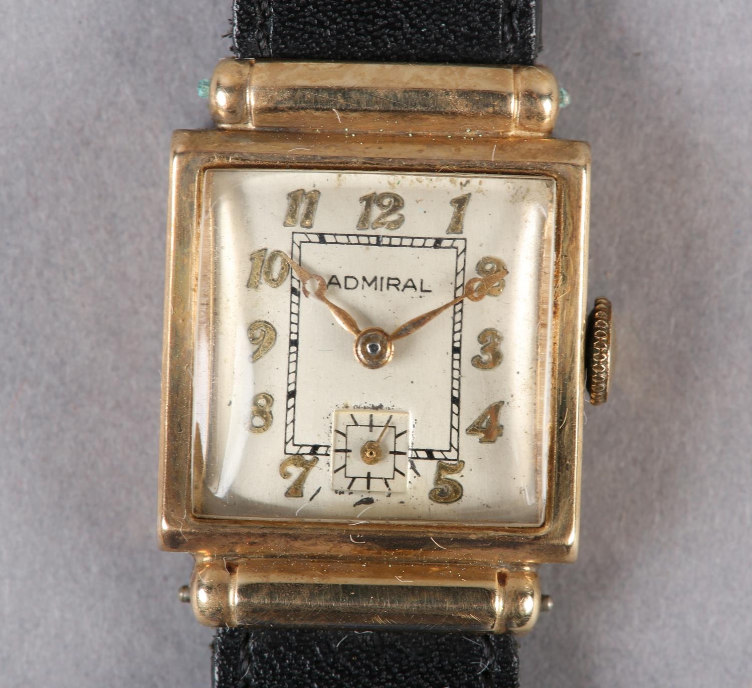 AN ADMIRAL LADY's DRESS WRISTWATCH, c1940, in rectangular 14ct gold case with barrel lugs, Swiss
