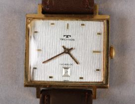 A TECHNOS GENTLEMAN'S DRESS DATE WRISTWATCH, c1965, in a rectangular rolled gold case no 1073936,