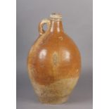 A LATE 17TH/EARLY 18TH CENTURY RHENISH BELLARMINE of typical form, salt glaze stoneware, impressed