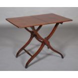 A LATE VICTORIAN MAHOGANY COACHING TABLE with folding top and frame, maker Tom & Sons, London no: