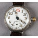 A WWI ERA WRISTWATCH IN SILVER CASE NO 445346, Swiss jewelled lever movement, white enamel dial with