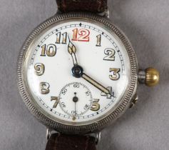 A WWI ERA WRISTWATCH IN SILVER CASE NO 445346, Swiss jewelled lever movement, white enamel dial with