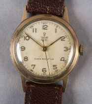 A TUDOR GENTLEMAN'S ROYAL MANUAL WRISTWATCH, c1952, in 9ct gold case made for ROLEX by AL Denison no