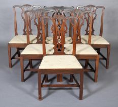 A SET OF FIVE 18TH CENTURY DINING CHAIRS AND ONE SIMILAR, with serpentine top rail, pierced splat,