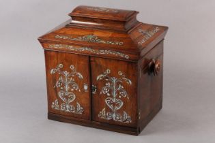 A LATE REGENCY ROSEWOOD AND MOTHER-OF-PEARL INLAID CASKET, with sarcophagus lift up lid over two