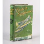 A LYON’S ASSORTED TOFFEE TIN formed as a book on ‘British Seaplanes: The Supermarine Rolls-Royce S.