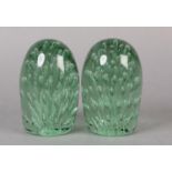 PAIR OF VICTORIAN GREEN GLASS DUMPS with bubble incisions, 12.7cm high